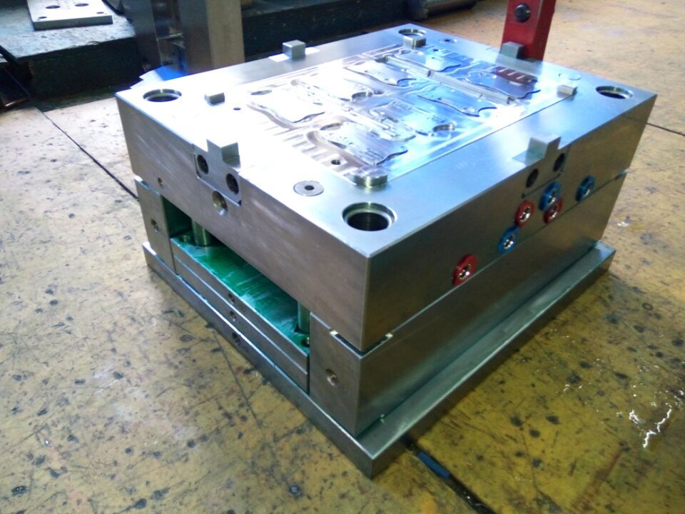 Injection mold for top and bottom plastic housings
